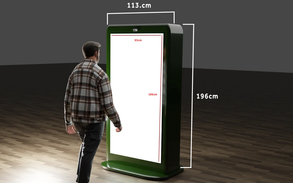 A person stands beside a green display mockup with width and height annotations.
