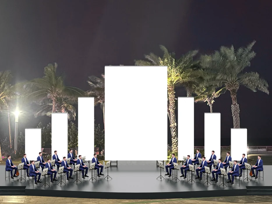 A nighttime stage mockup with a central display, staggered side screens and seated musicians.