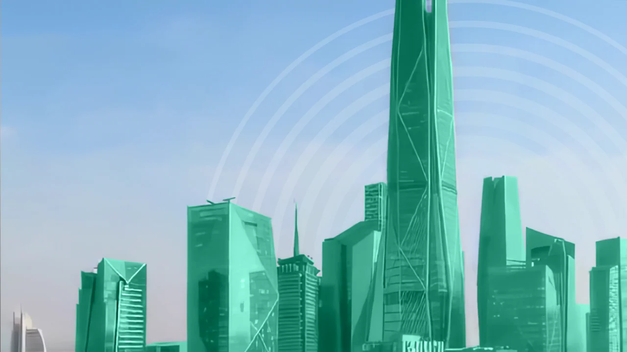 A green city skyline with a tall central tower, pale concentric circles and a blue sky.