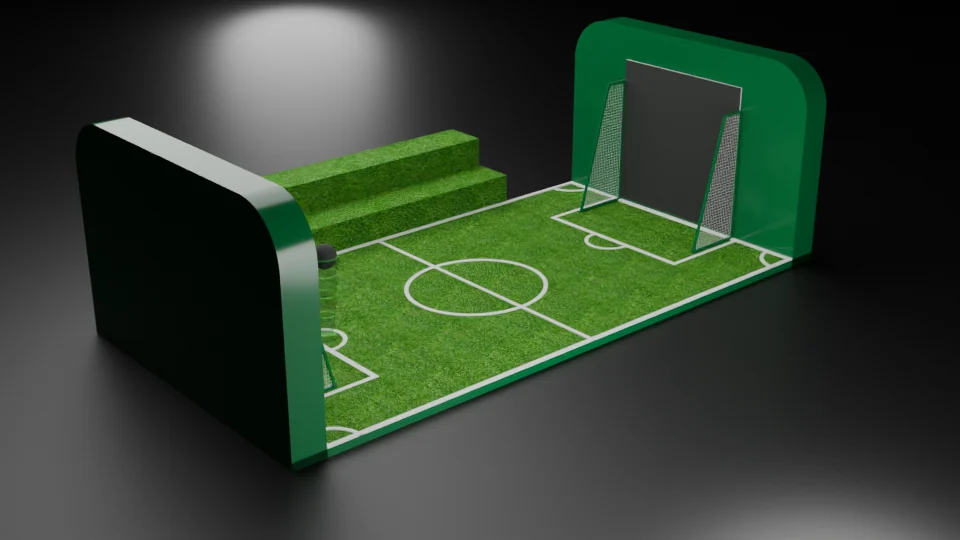 An angled native view of the miniature pitch, stepped turf bench, end wall and opposite netted goal.